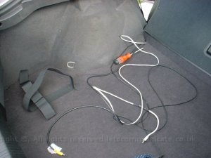 Fitting The Cables4.jpg - I used velcro to hold the CPU in the rear of the car. This was a cheap but effective mounting solution. Here you can see where all the cables feed to and where the main CPU was located